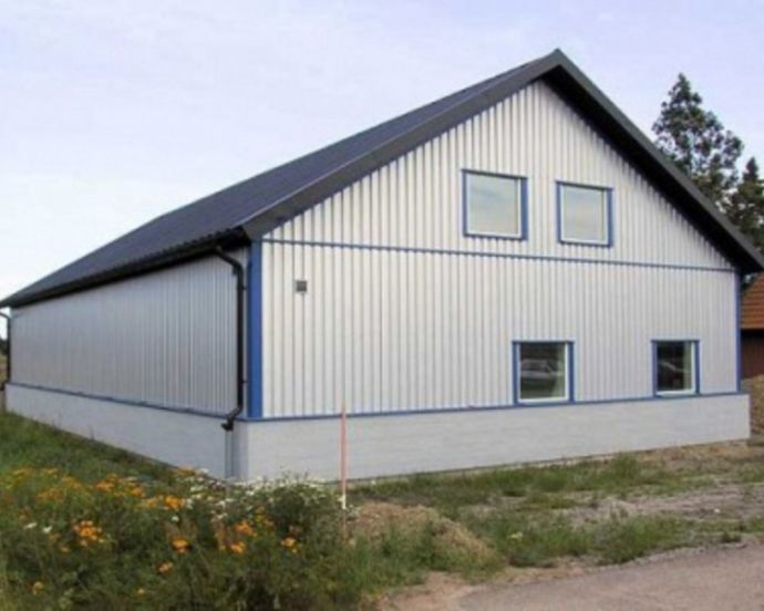 Обшивка будинку профнастилом: фото та ціни Обшивка будинку профнастилом: фото та ціни