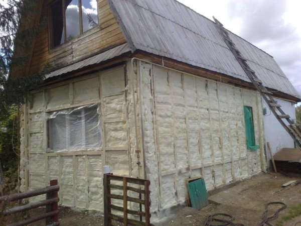 Як провести утеплення будинку з бруса 150х150 зовні?