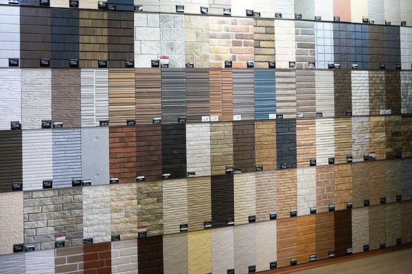 Огляд характеристик і переваг панелей виброцементного сайдинга