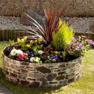 Як зробити клумбу з цегли своїми руками