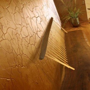 Штукатурка цегляних стін всередині будинку