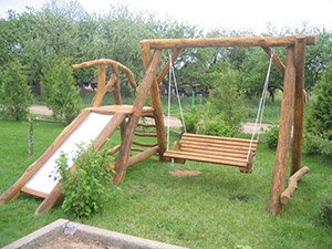 Гойдалки з дерева своїми руками: види та матеріали, креслення з розмірами, фото і відео