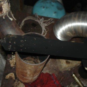 Як виготовити піч буржуйку для гаража з цегли і металу?