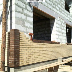 Облицювання будинку з газобетону цеглою своїми руками