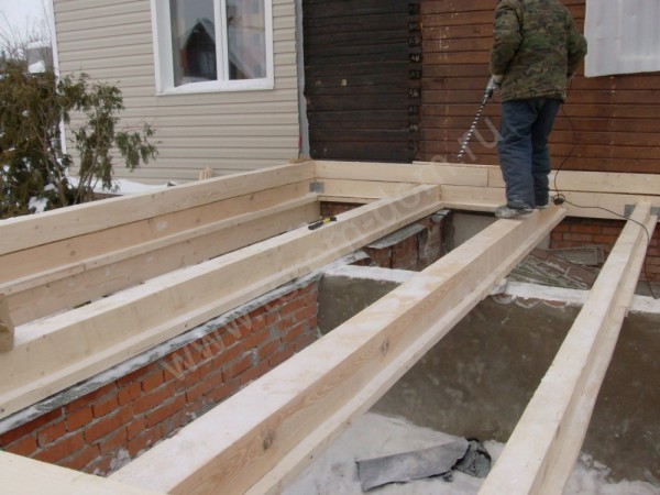 Як можна прилаштувати прибудову до будинку з бруса?