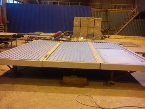 Утеплення воріт. Утеплені секційних, розпашних, рулонних конструкції. Самостійне ущільнення полотен