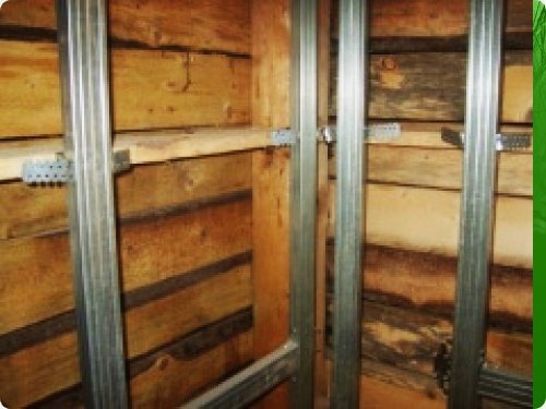 Теплоізоляція стін деревяного будинку. Підготовка поверхні. Настил утеплювача і монтаж на стіни