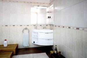 Кутова раковина з тумбою для ванної: розміри, фото та ціни