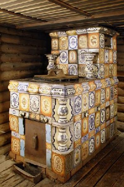 Способи оздоблення печі в приватному будинку: плиткою, декоративним каменем, склошпалерами