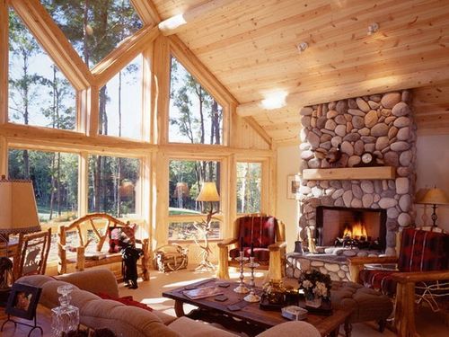 Великі каміни в інтерєрі вітальні: фото з цегли та каменю Великі каміни в інтерєрі вітальні: фото з цегли та каменю