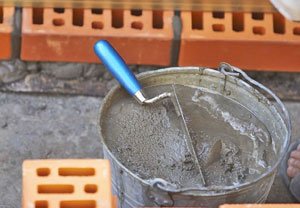 Вчимося обкладати чавунну пічку цеглою: технологія роботи