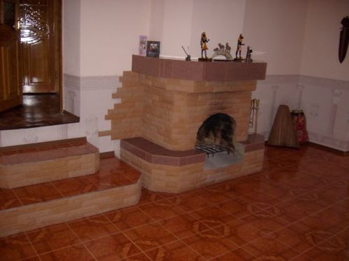 Декоративна штукатурка для камінів та печей: фото