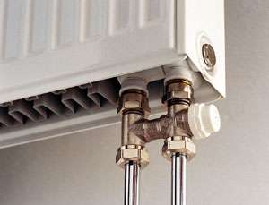 Алюмінієві і сталеві радіатори опалення з нижнім підключенням   переваги і схеми