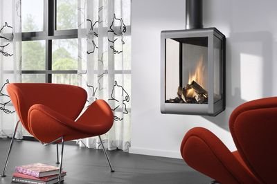 Монтаж підвісної каміна на стіні: фото в інтерєрі