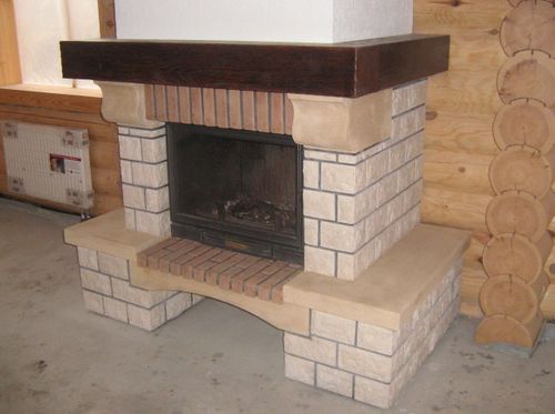 Облицювання каміна плиткою своїми руками: фото та відео