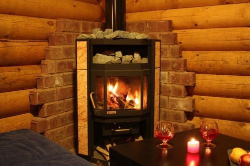 Деревяний камін своїми руками: фото в інтерєрі, відео