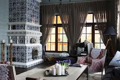 Способи оздоблення печі в приватному будинку: плиткою, декоративним каменем, склошпалерами