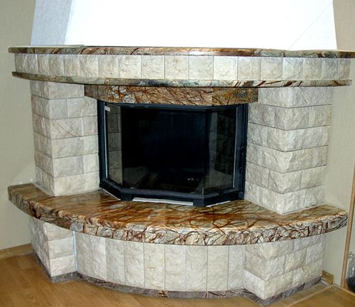 Як обкласти камін: плиткою, цеглою, каменем