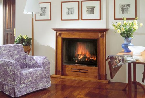 Камін в котеджі: фото в інтерєрі вітальні