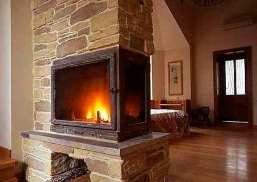 Фото камінів в інтерєрі квартири: дизайн вітальні з каміном в приватному будинку Фото камінів в інтерєрі квартири: дизайн вітальні з каміном в приватному будинку