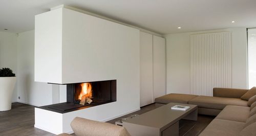 Тристоронній камін: фото в інтерєрі кімнати