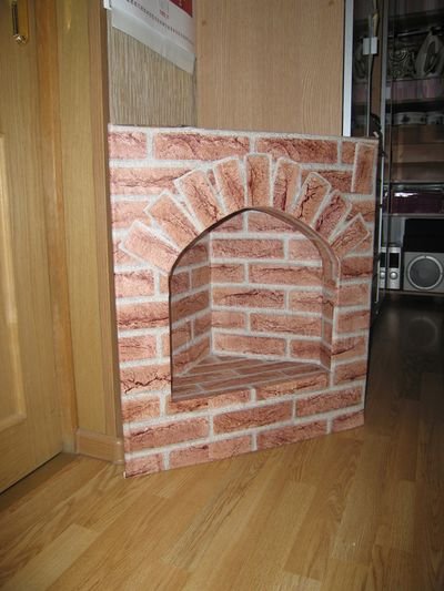 Камін з картону: фото, відео інструкція своїми руками