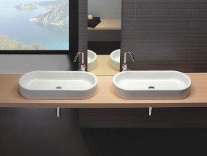 Накладна раковина на стільницю для ванної кімнати: кутова, скляна