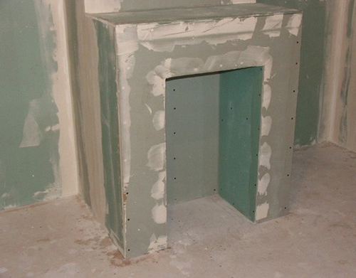 Як зробити декоративний камін з гіпсокартону: відео своїми руками, фото