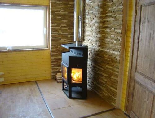 Камін в каркасному будинку: відео своїми руками, фото