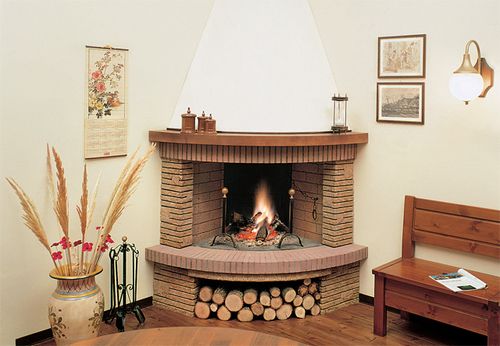 Пристінні каміни: кутові, електричні, з цегли своїми руками