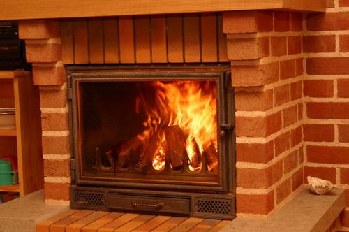 Декорувати камін з цегли плиткою: декор своїми руками