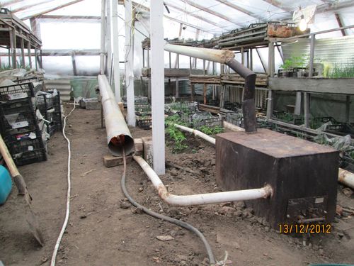 Піч тривалого горіння, для опалення теплиці: фото, відео своїми руками