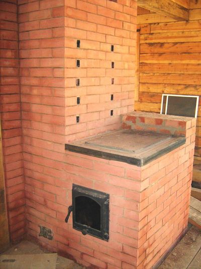 Піч економка: порядовка своїми руками, відео, фото