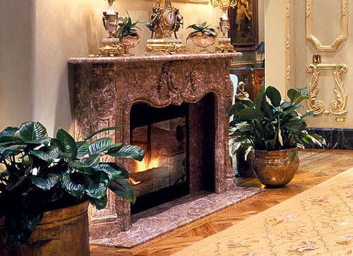 Камяні каміни для дому: фото в інтерєрі