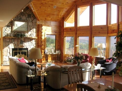 Великі каміни в інтерєрі вітальні: фото з цегли та каменю Великі каміни в інтерєрі вітальні: фото з цегли та каменю