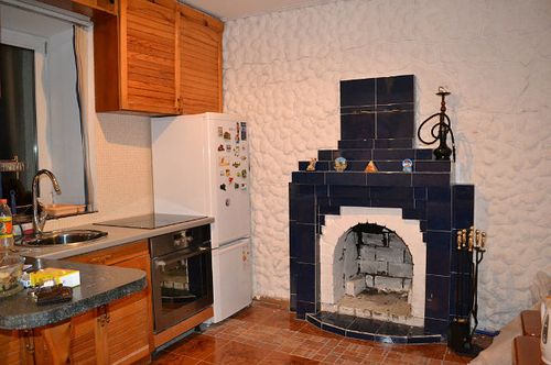 Як обкласти камін: плиткою, цеглою, каменем