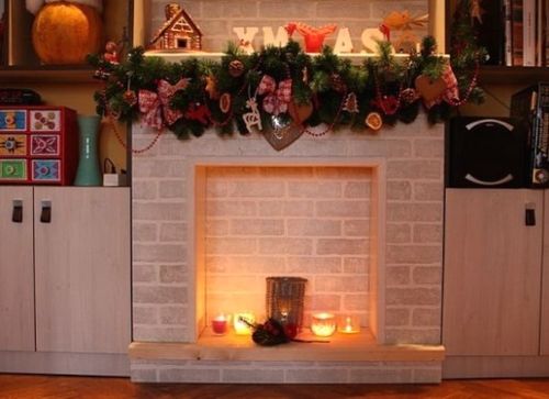 Декорувати камін з цегли плиткою: декор своїми руками