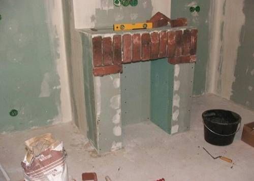 Як зробити декоративний камін з гіпсокартону: відео своїми руками, фото