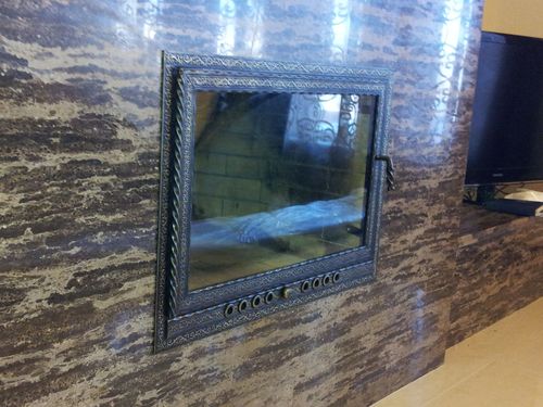 Скляні дверки для камінів та печей: фото варіанти