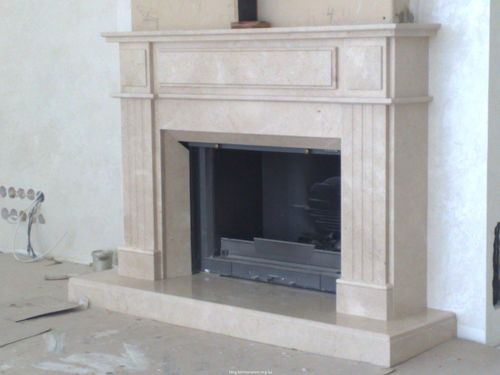 Мармурові каміни в інтерєрі: фото та монтаж