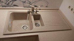 Кутова мийка для кухні: нюанси вибору Кутова мийка для кухні: нюанси вибору