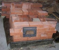Цегляна піч для лазні з топкою з передбанника своїми руками: поетапна технологія і правила кладки Цегляна піч для лазні з топкою з передбанника своїми руками: поетапна технологія і правила кладки