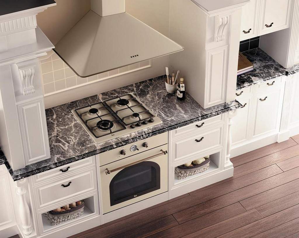 Камінні витяжки для кухні: кутова і купольного типу