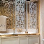 Золота плитка для ванної кімнати: нетипової дизайн