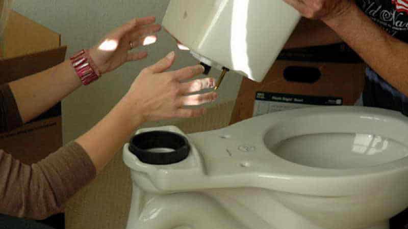 Як зняти кришку бачка унітазу з кнопкою