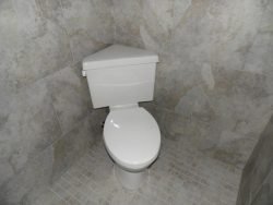 Кутовий унітаз – економія місця в невеликому туалеті