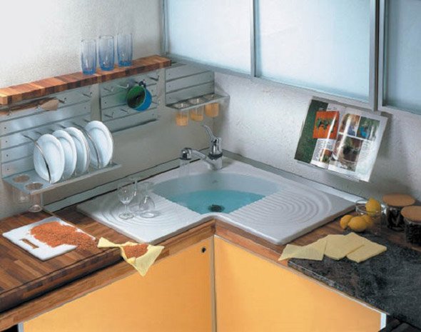 Кутова мийка для кухні: нюанси вибору Кутова мийка для кухні: нюанси вибору