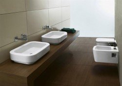 Накладна раковина на стільницю: вибираємо і встановлюємо своїми руками Накладна раковина на стільницю: вибираємо і встановлюємо своїми руками