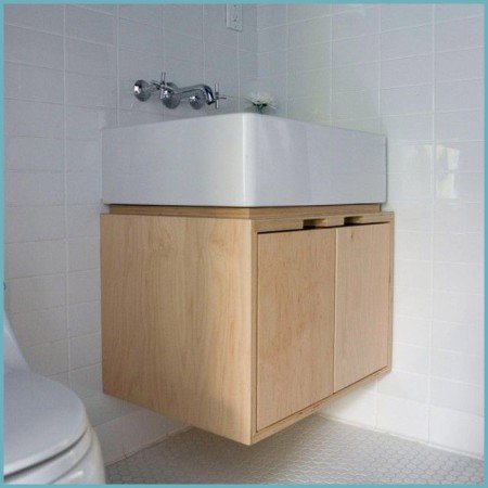 Кутова раковина з тумбою: зберігаємо простір у ванній кімнаті