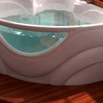 Кутова ванна: фото дизайну інтерєру